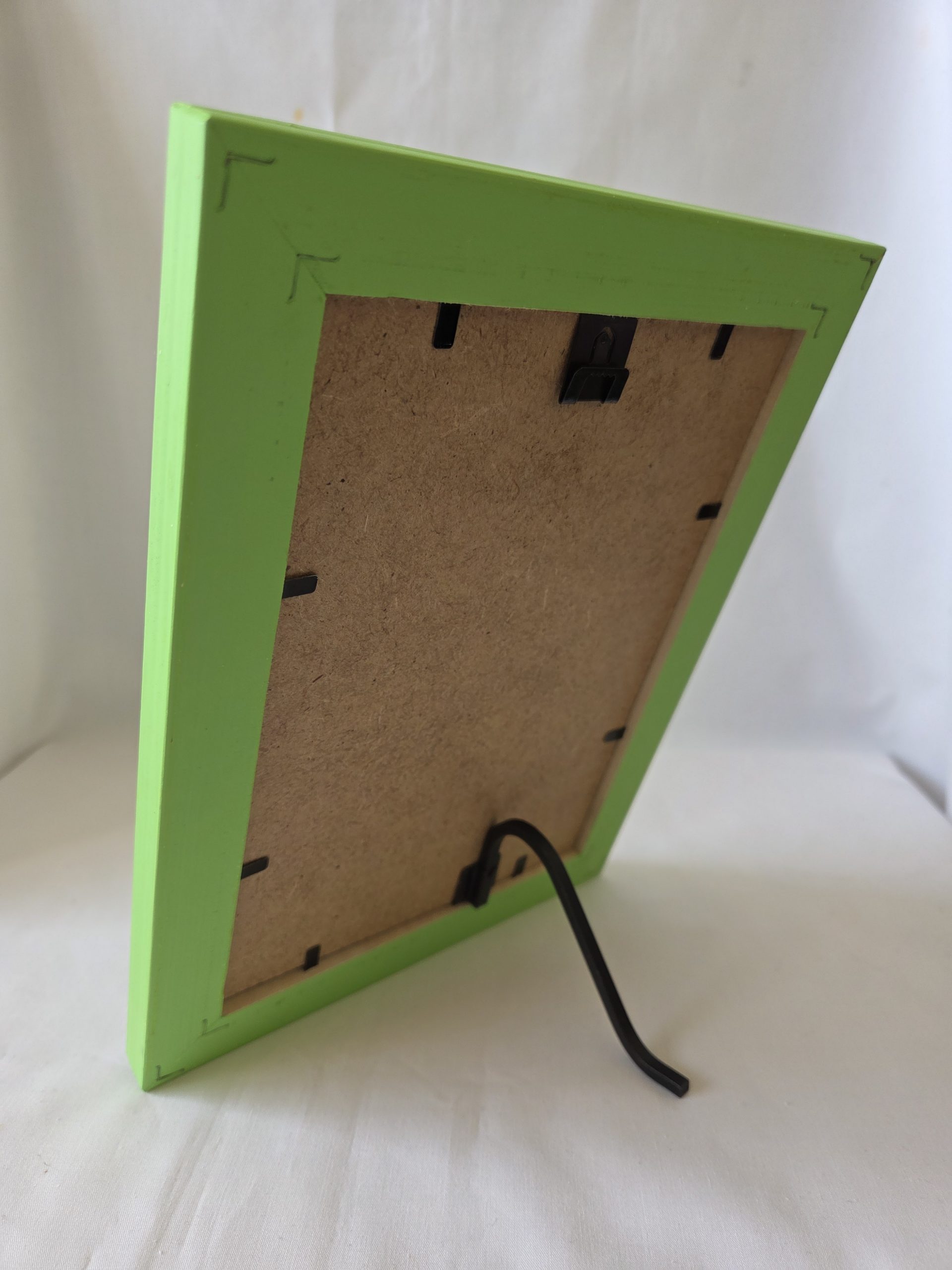 Back view of a Green Painted Photo Frame showing the black metal stand
